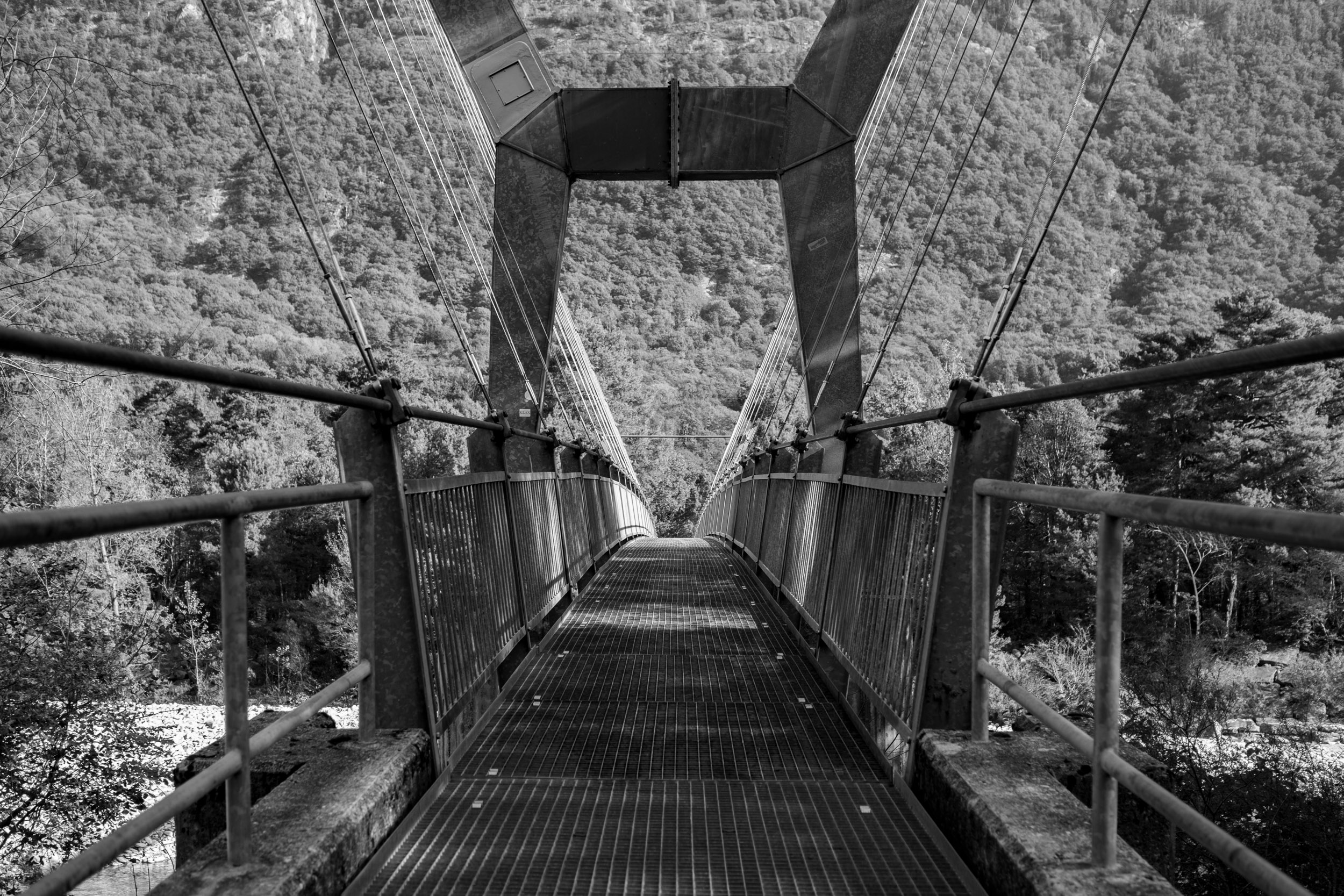 Suspension bridge crossing the river Maggia.