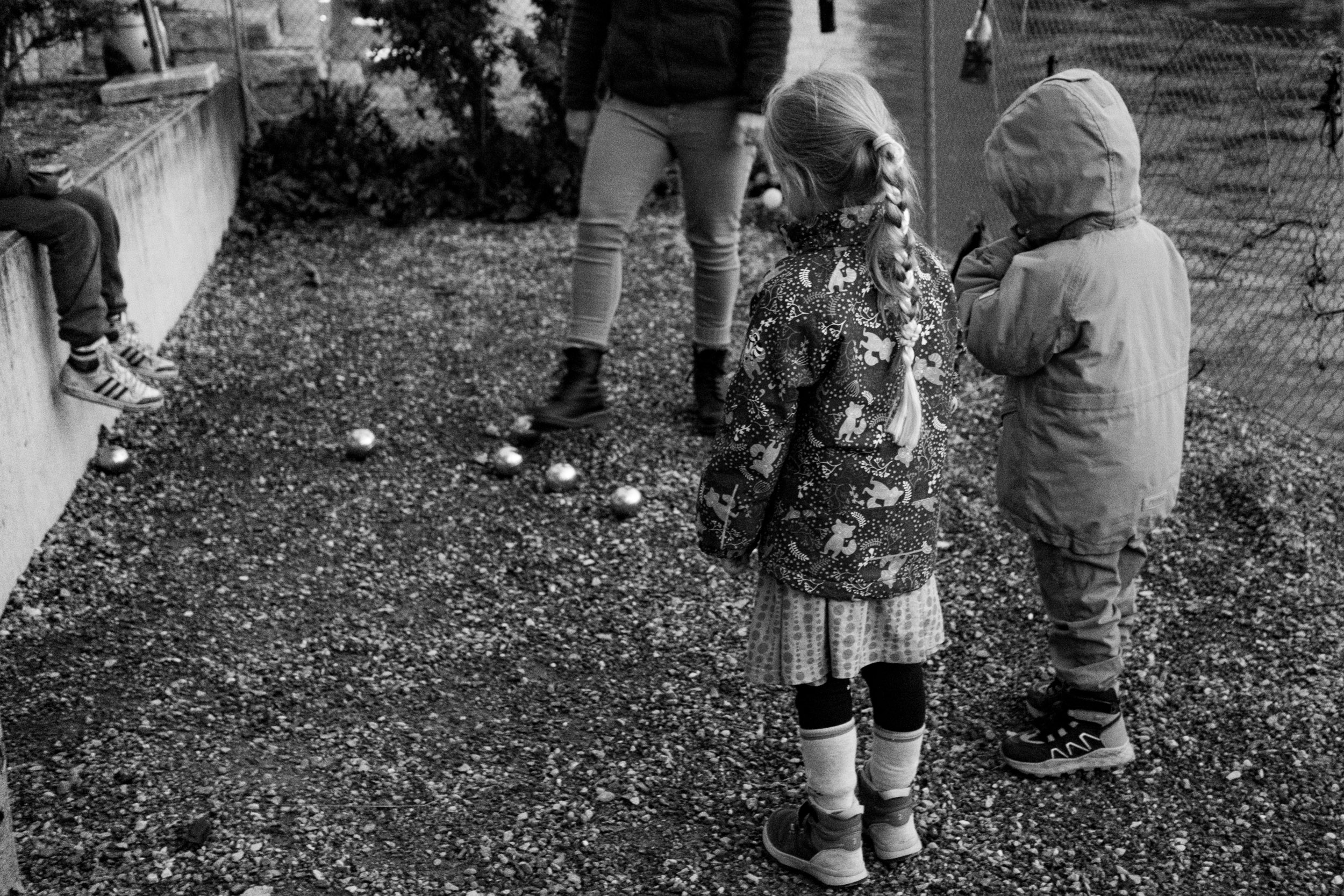 My kids learning to play Boules.