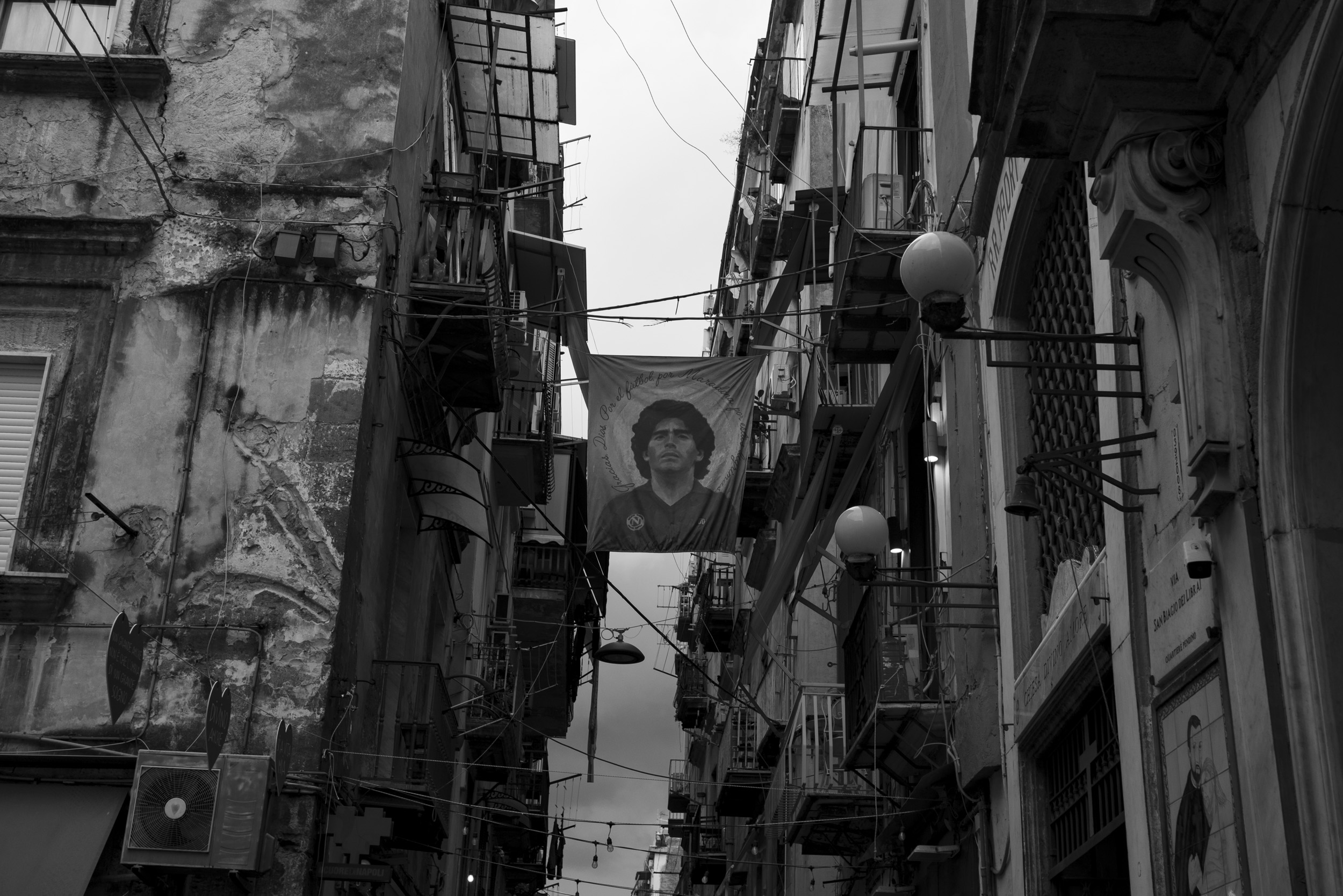 A depiction of Diego Maradona in the streets of Napoli, where he's worshipped like a saint.