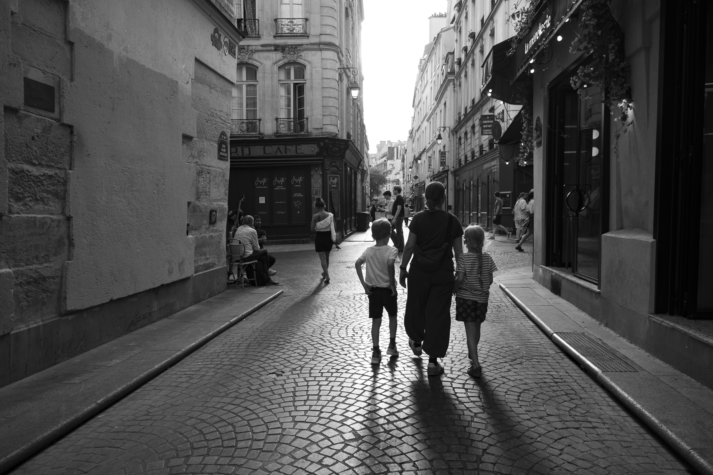 My family, walking in the streets of Paris shortly after we arrived today.